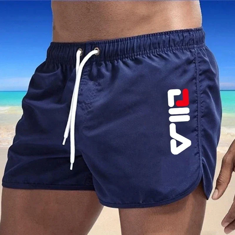 Trunk Breathable Men - ชุดว่ายน้ำชายฤดูร้อนปี 2026 กางเกงชายหาดระบายอากาศ กางเกงว่ายน้ำสำหรับเล่นเซิร์ฟ กางเกงออกกำลังกาย กางเกงขาสั้นลำลองลายพิมพ์สำหรับชายหาด
